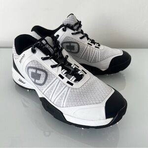 OGIO XWrap Foot Chassis Golf  Spiked Cleats Black and White Shoes